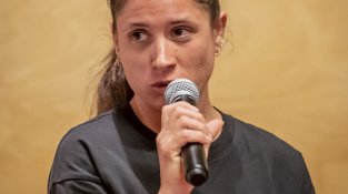 Les participants, en un moment del debat