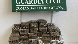 La droga estava amagada en un rerefons (cliqueu per ampliar)