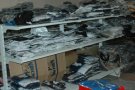 15.000 peces de roba falsificades i 14.600 euros en bitllets falsos en un magatzem del C/Major