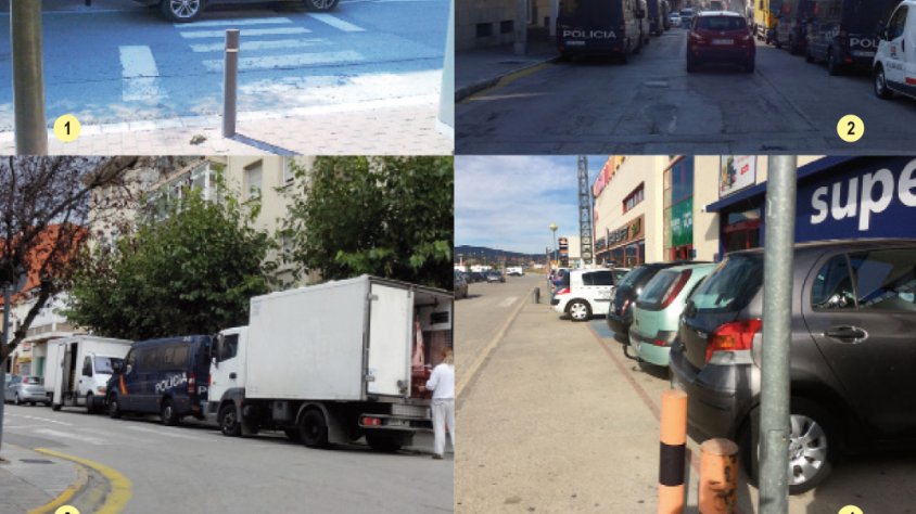 Vehicles policials mal estacionats sense llums d'emergència pels carrers de la Jonquera